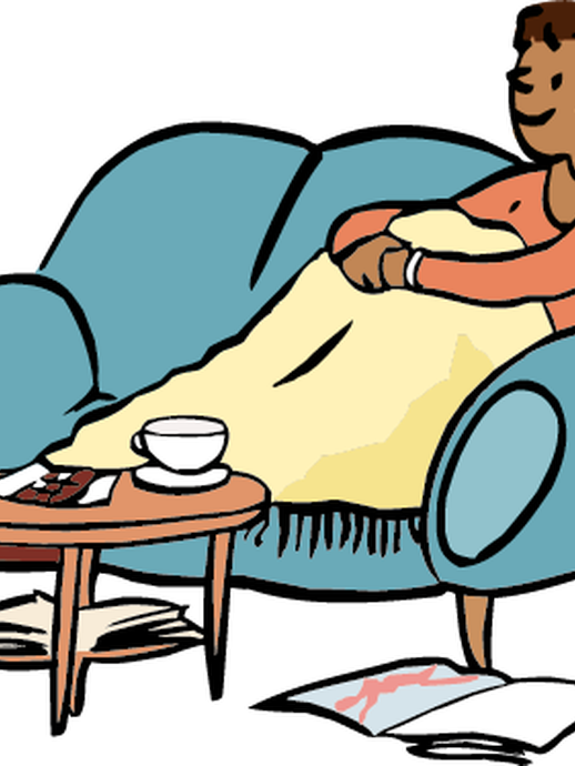 Eine Frau sitzt gemütlich auf einem Sofa (öffnet vergrößerte Bildansicht)