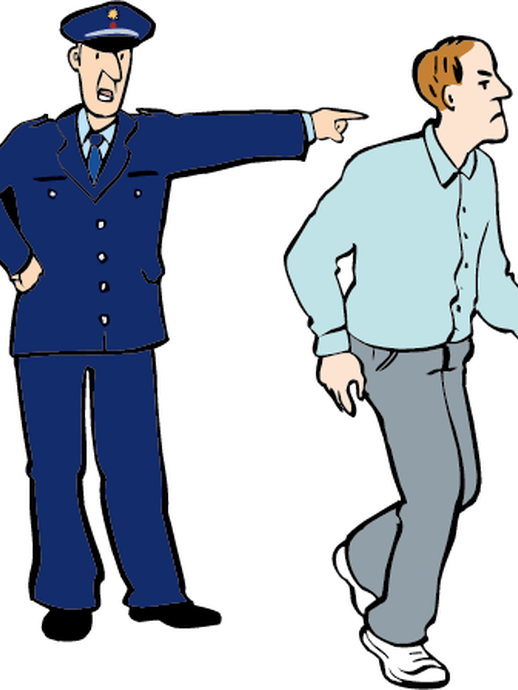 Ein Polizist verweist eine Person des Platzes (vergrößerte Bildansicht wird geöffnet)