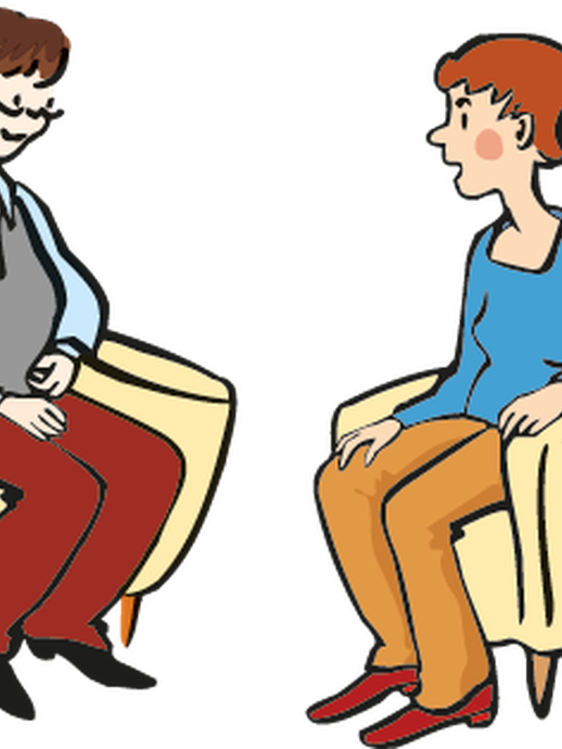 Zwei Frauen sitzen sich gegenüber und reden miteinander (öffnet vergrößerte Bildansicht)